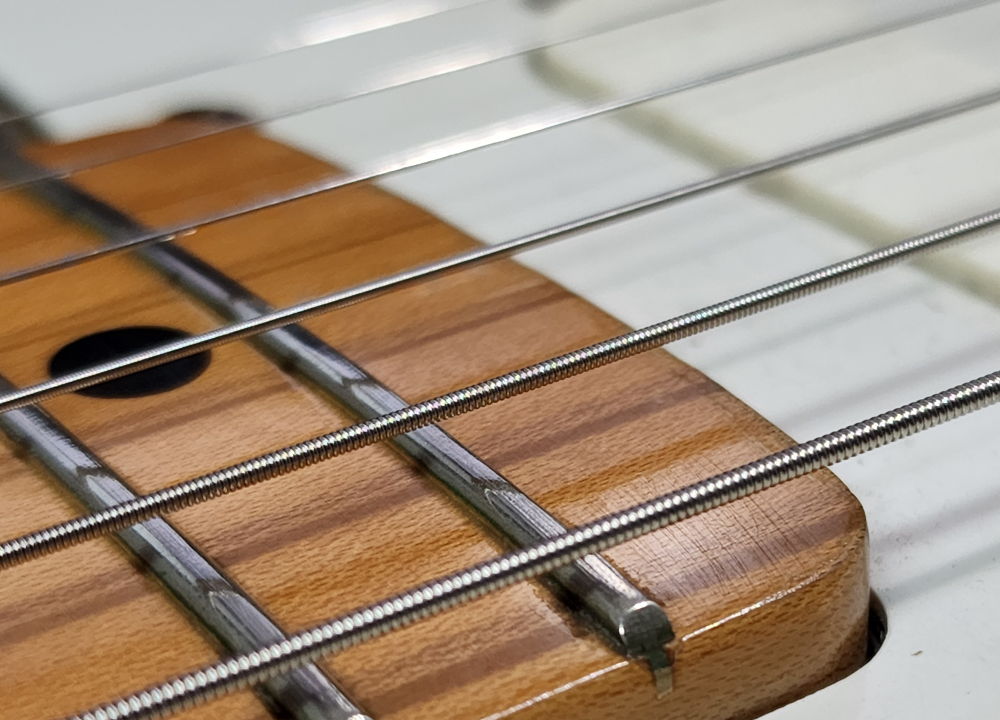 Rehab Maple Neck and Low E strings